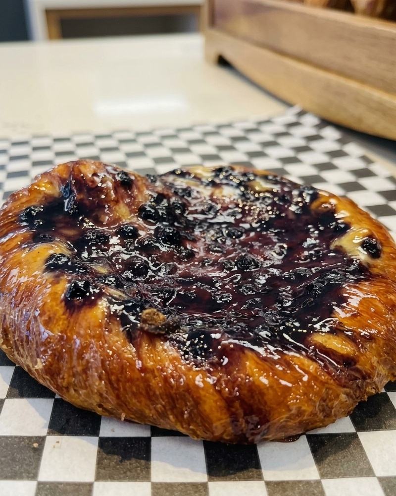 Blueberry danish with glossy berry filling